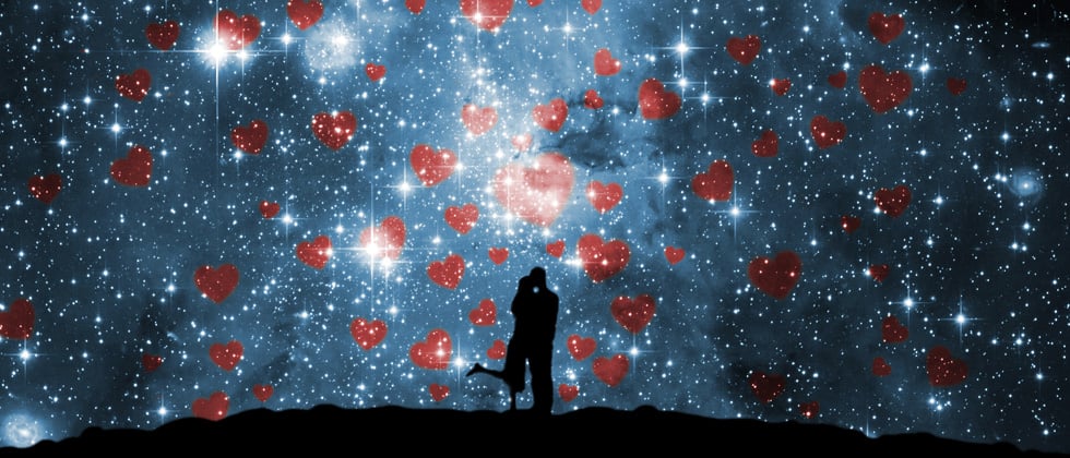 A couple sharing a kiss under a starry night with hearts filling the sky