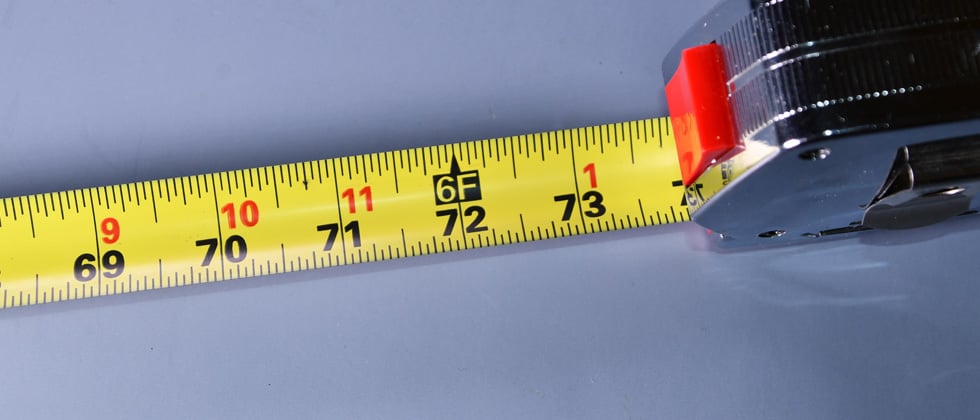A tape measure showing a height of 6'2