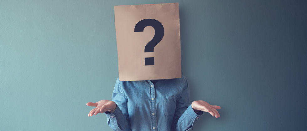 A person with a brown paper bag with a question mark over their head