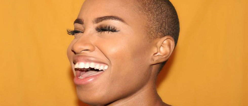 A close up of a woman laughing