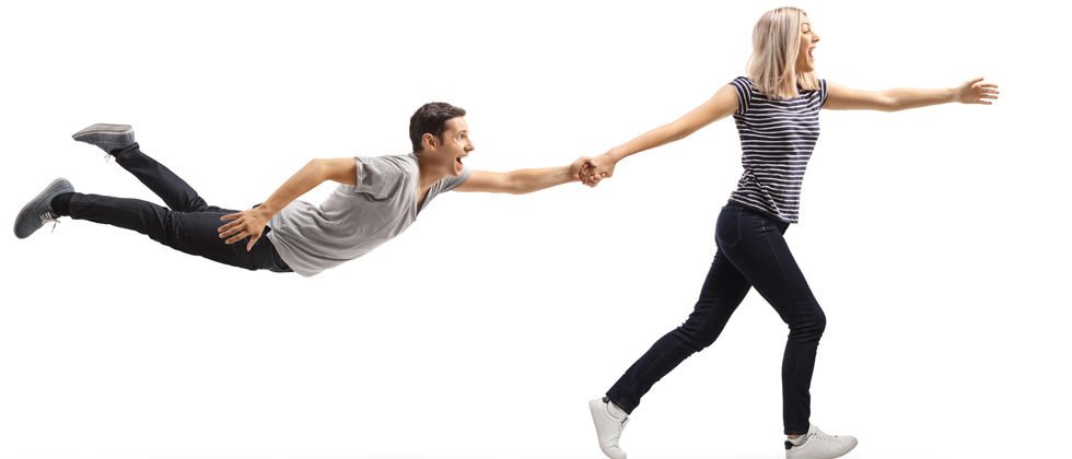 Woman pulling guy's hand and pulling him toward the future