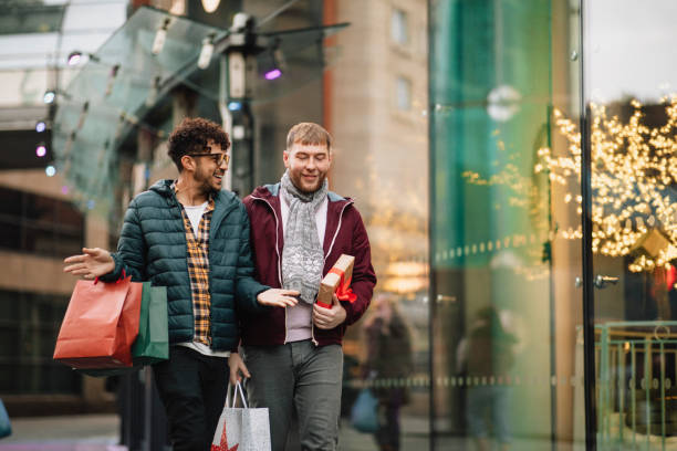 Gay couple going shopping for christmas gifts.