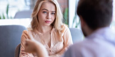 Woman looks annoyed as symbol of how to stop being jealous