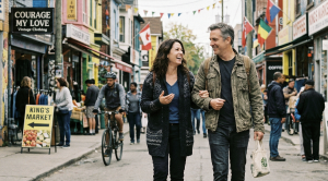 A couple strolling on a date through kensington market in toronto, ontario.